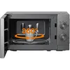 An open microwave with a mug inside, illustrating a 360-degree rotation feature. Anteprima dell’immagine prodotto