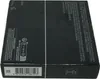 The image shows the side and bottom of a black product box. Podgląd zdjęcia produktu