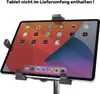 A tablet is held in a stand, with the screen displaying app icons. Voir les images du produit