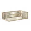 A wooden baby playpen with a gate, shown from a side angle against a white background. Produktbild-Vorschau
