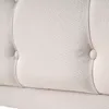 A close-up view of the tufted fabric of a bed frame. Anteprima dell’immagine prodotto