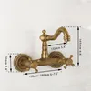 A vintage-style brass wall-mounted faucet with dimensions indicated by measurement lines and text. Podgląd zdjęcia produktu