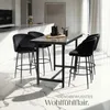 A modern kitchen or dining area with a bar table and stools. Náhled obrázku produktu