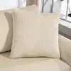 A close-up view of a cream-colored corduroy sofa with two pillows. Podgląd zdjęcia produktu
