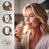 A woman drinks from a glass while an infographic shows how to prepare a drink. Produktbild-Vorschau