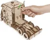 A hand is shown turning a knob on a wooden model truck. Podgląd zdjęcia produktu