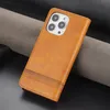 A brown leather flip case for an iPhone 13 Pro is shown at an angle. Produktbild-Vorschau