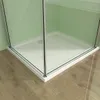 Close-up view of the base of a modern shower enclosure, showing the white shower tray and glass panels, set against a light green wall and a wooden floor. Produktbild-Vorschau