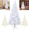 A collage of images showing a white artificial Christmas tree in different settings, including a room with a fireplace and a bookshelf-filled room. Two stylized Christmas tree graphics are also present. Voir les images du produit