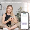A woman is sitting on a couch, using her phone and wearing earbuds, with a translation app displayed on her phone screen. Produktbild-Vorschau