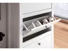 A white shoe cabinet with a drawer pulled out, revealing shoes inside. Produktbild-Vorschau