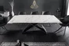 A modern dining room with a marble-top dining table and black chairs. Produktbild-Vorschau