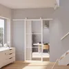 weiß gerahmte Glasschiebetür aus Klarglas in modernem, hellem Wohnraum
 Produktbild-Vorschau