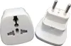 Two white travel adapters are shown against a white background. Produktbild-Vorschau