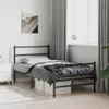 A bedroom scene with a metal bed frame, bedding, and a painting on the wall. Podgląd zdjęcia produktu