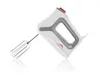 A white hand mixer with gray accents and a red button is shown against a white background, with its reflection visible below. Náhled obrázku produktu