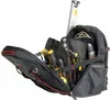 A tool backpack filled with various tools, including screwdrivers, wrenches, and a drill, with a level sticking out of the top. Voir les images du produit