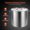 A large stainless steel pot with a lid, presented against a dark background with feature callouts. Voir les images du produit