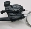 A close-up view of a black bicycle gear shifter. Anteprima dell’immagine prodotto