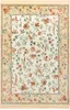 A floral patterned rug laid flat on a white background.
