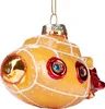 A close-up studio shot of a yellow glass Christmas ornament shaped like a submarine. Náhled obrázku produktu