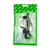 Earphones in a clear plastic package with green branding. Anteprima dell’immagine prodotto