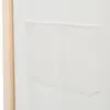 A close-up view of a cream-colored fabric pocket on a room divider. Anteprima dell’immagine prodotto