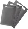 A set of three gray cutting boards stacked on a white background. Anteprima dell’immagine prodotto