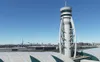 A view of a city skyline with a prominent control tower in the foreground. Anteprima dell’immagine prodotto