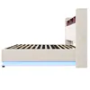 Side view of a beige upholstered bed frame with a slatted mattress base and LED lighting underneath. Náhled obrázku produktu