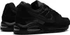 A pair of black Nike Air Max Command sneakers shown from a side-rear angle. Produktbild-Vorschau