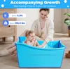 A mother and baby are in a blue foldable bathtub. Náhled obrázku produktu