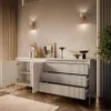 A modern living room with a beige sideboard and decorative items. Produktbild-Vorschau