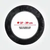A close-up view of a black sheepskin steering wheel cover, with text indicating its size and availability in other colors. Produktbild-Vorschau