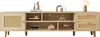 A light wood TV cabinet with rattan details, decorated with various small decorative items and a lamp. Produktbild-Vorschau