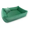 A green corduroy dog bed with a small pillow. Náhled obrázku produktu