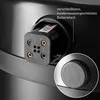 A close-up view of a battery compartment and a control knob on a black appliance. Produktbild-Vorschau