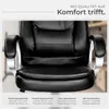 Close-up of a black office chair with silver armrests, featuring text overlays describing its features. Voir les images du produit