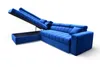 A blue sectional sofa with its storage compartment open, shown against a white background. Náhled obrázku produktu