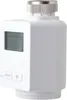 A white radiator thermostat with a digital display and control buttons. Produktbild-Vorschau