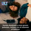 Two young women are lying on the floor, laughing, with a SONY speaker placed between them. Voir les images du produit
