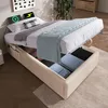 A bed with storage is shown in a bedroom setting. Produktbild-Vorschau