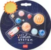 A set of solar system-themed erasers in their original packaging. Voir les images du produit