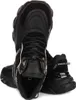 A pair of black Guess sneakers. Produktbild-Vorschau