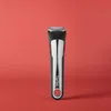 A single Tefal Ingenio handle is centered against a plain red background. Voir les images du produit