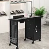 A black nail technician table with a built-in fan and storage is shown in a salon or retail setting. Voir les images du produit