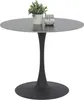 A round dining table with a matte black marble-look top and an anthracite trumpet base, adorned with a potted plant and a small jar filled with decorative stones. Produktbild-Vorschau