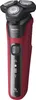 A studio shot of a red and black electric shaver. Náhľad obrázku produktu