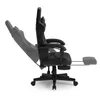 A black gaming chair is shown from the side with its footrest extended and the back reclined. Anteprima dell’immagine prodotto