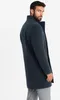 A man wearing a blue coat and gray pants, posing against a white background. Anteprima dell’immagine prodotto
